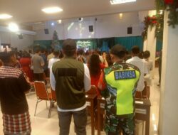 Babinsa, Linmas, dan Pecalang Jaga Natal Damai