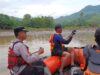 Polsek Lambu dan Tim SAR Lakukan Pencarian Korban Terseret Arus Banjir di Bendungan Diwu Moro