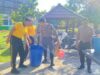 Ciptakan Lingkungan Kerja Nyaman, Personel Polres Bima Kota Gotong Royong Bersih Mako