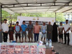 Polres Bima Kota Bagikan 1.100 Paket Daging Qurban untuk Masyarakat