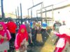 Bhabinkamtibmas bersama Warga Kompak gotong royong Pulihkan Rumah Korban Kebakaran