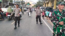 Personel Polsek Woha Menggelar Pengamanan dan Pengawalan Pawai Ta’aruf Pembukaan MTQ Tingkat Kecamatan Woha ke-58