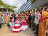 Pastikan Keamanan Anak-Anak, Kapolsek Buer Kawal Ketat Pawai Budaya Tingkat TK dan PAUD