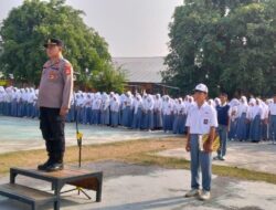 Polisi Peduli Pendidikan, Kapolsek Belo Jadi Irup Bendera di SMA Negeri I Belo