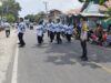 Polsek Kempo Amankan Lomba Gerak Jalan Indah HUT PGRI ke-81, Arus Lalu Lintas Tetap Terkendali